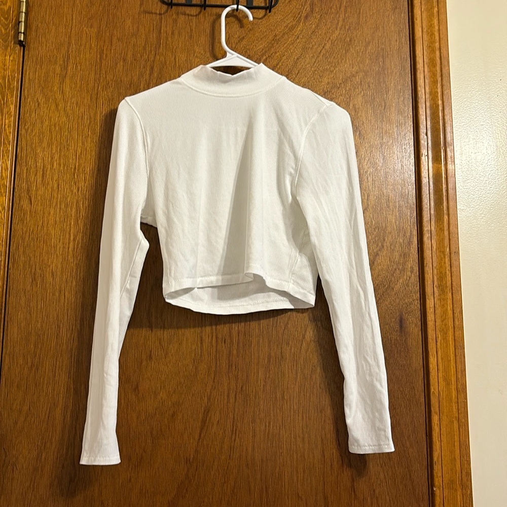 a ribbed cropped turtle neck
